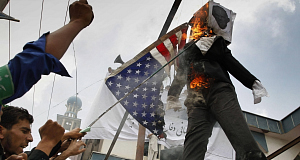 Afghans burn an effigy of Dove World Outreach Centers pastor Terry Jones during a demonstration against the United States in Kabul, Afghanistan, on Monday. Pic: AP Afghans burn an effigy of Dove World Outreach Centers pastor Terry Jones during a demonstration against the United States in Kabul, Afghanistan, on Monday. Pic: AP