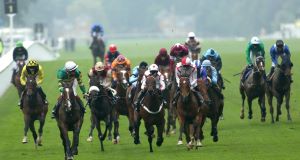 Well Sharp (second left) ridden by Frank Berry on the way to winning The Ascot Stakes. Picture: PA
