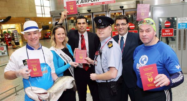 Steve Redmond (far right) receiving his Cork passport