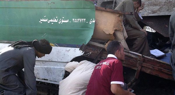 Distraught relatives search for signs of their loved ones in the wreckage of today's crash.