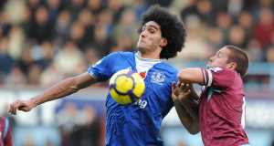 Evertons Marouane Fellaini and West Ham Uniteds Matthew Upson (right) battle for the ball. Evertons Marouane Fellaini and West Ham Uniteds Matthew Upson (right) battle for the ball.