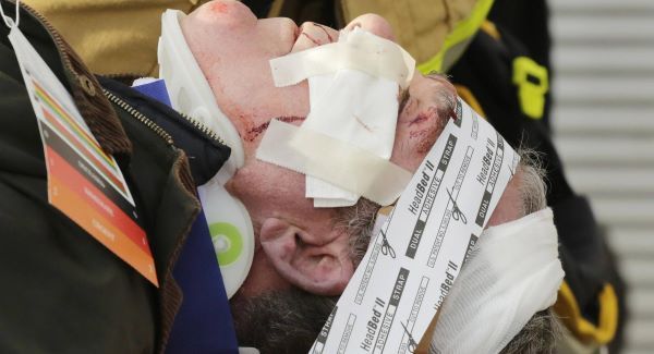  A victim of the Seastreak Wall Street ferry accident waits to be carried by stretcher to an ambulance. Picture: AP