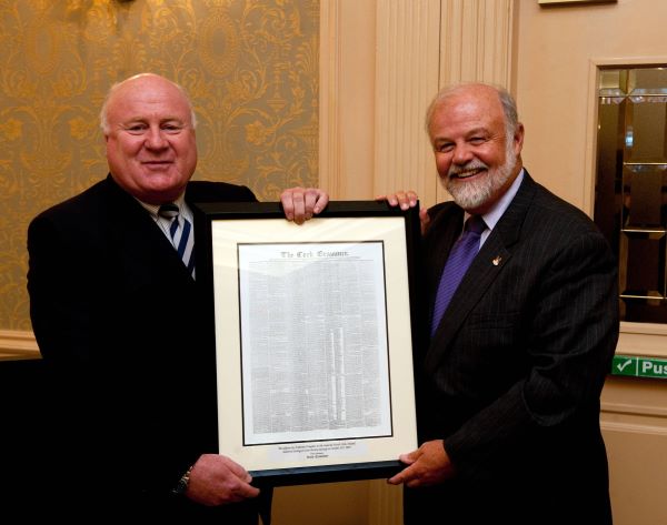 Alan Crosbie, CEO of Thomas Crosbie Holdings presents Maryland Secretary of State John McDonough with a framed commemorative front page of "The Cork Examiner" on his visit to Cork