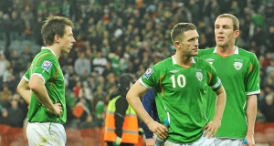 Dejected Republic of Ireland players Sean St. Ledger, Robbie Keane and Richard Dunne, at the end of the game. Picture: SPORTSFILE