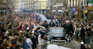  President John F Kennedy makes his way up St Patricks St 