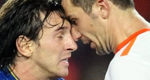 Lionel Messi, Barcelona, squaring up with Srna Darijo, Shaktar Donetsk.