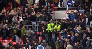 Trouble breaks out in the stands between the Millwall fans and police during the FA Cup semi final at Wembley last weekend. Picture: PA