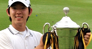 Noh Seung-yul of South Korea shows off his trophy after winning the Maybank Malaysian Open golf tournament in Kuala Lumpur, Malaysia today.