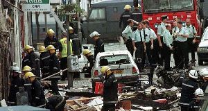One of the alleged Omagh bombers was remanded in custody in Belfast today following a legal bid to extradite him to Lithuania to face arms smuggling charges.