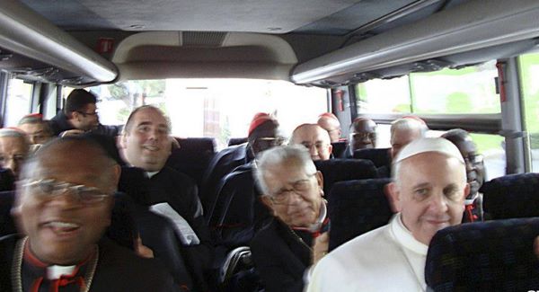 Pope Francis, right, is seen aboard a minibus with other Cardinals at the Vatican on Thursday, the day after his election (AP Photo/CNBB, Antonio Luiz Catelan)