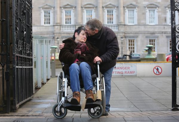 Sean and Niamh Barrett from Fairview during a protest outside the Leinster House demanding the restoration of cut to the Respite Care Grant announced in the Budget