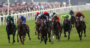 Declaration of War ridden by Joseph O'Brien (dark blue) wins The Queen Anne Stakes. Picture: PA