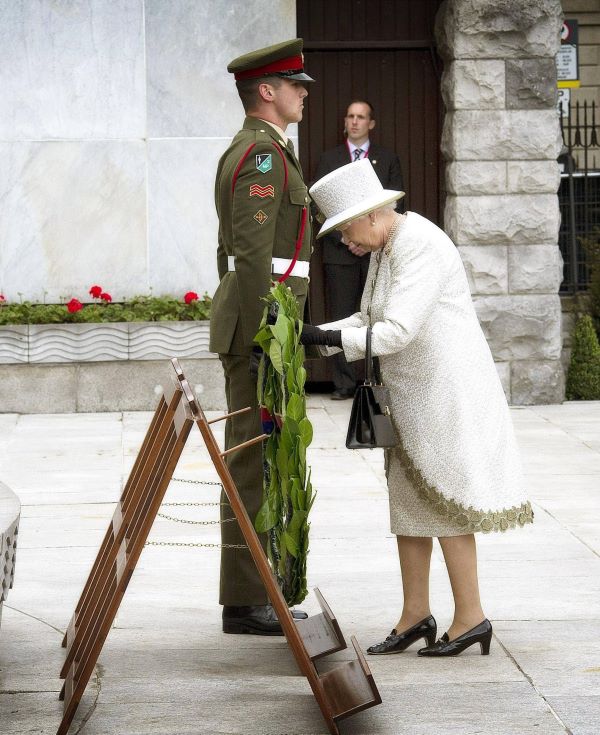 Queen Elizabeth II lays a wreath at the at the Garden of Remembrance.