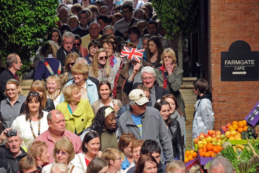 Crowds greet the Queen in the English Market.