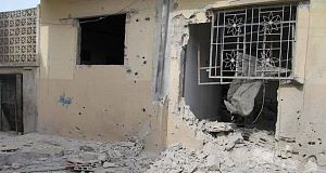In this citizen journalism image provided by the Local Coordination Committees in Syria, a damaged house from the Syrian government forces shelling at Baba Amr neighborhood in Homs province, Syria, today. In this citizen journalism image provided by the Local Coordination Committees in Syria, a damaged house from the Syrian government forces shelling at Baba Amr neighborhood in Homs province, Syria, today.