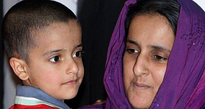 Five-year-old Sahil Saeed back at home in Oldham, Greater Manchester, with his mother Akila Naqqash