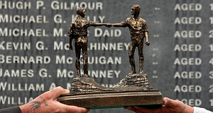 Relatives Kay Duddy and Gerry Duddy hold a statue symbolising Friendship and Forgiveness presented to the families by Protestant Church Leaders  in front of the Bloody Sunday Memorial in the Bogside. Pic: PA