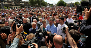 Sinn Féin leader Gerry Adams (centre) joins the crowds marching through Derry today.