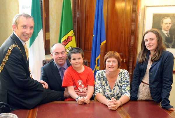 The Lord Mayor of Cork, Cllr. John Buttimer, photographed with Steve Redmond, the first person in the world to complete the Oceans 7 Challenge and his wife Ann and children Siadbh and Stevie