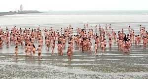 More than 2,500 hardy souls braved torrential rain early today for a massive nude photoshoot by acclaimed contemporary artist Spencer Tunick. More than 2,500 hardy souls braved torrential rain early today for a massive nude photoshoot by acclaimed contemporary artist Spencer Tunick.