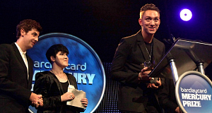 The xx pictured accepting their Mercury prize on Tuesday night.