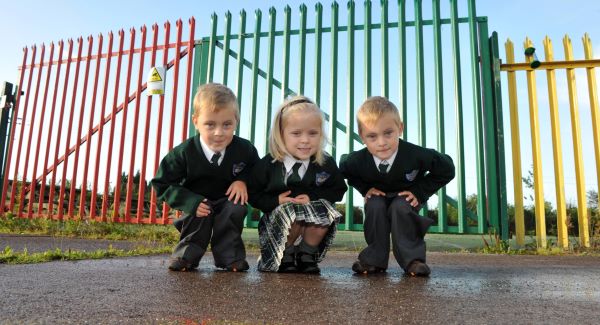 Harry Isobel and Daniel Byrd from Killeens, Co Cork on their first day at Gaelscoil Mhuscrai An Bhlarna