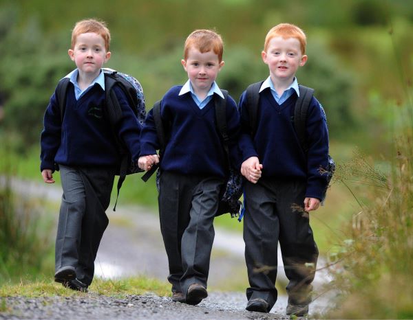 Pictured from left are Triplets Padraig, Sean and Micheal Casey leaving home at Bohocogram, Sneem, Co. Kerry for their first day at school at St. Michaels National School Sneem